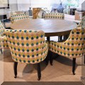 F47. Set of 6 polka dot upholsterd chairs on casters. 